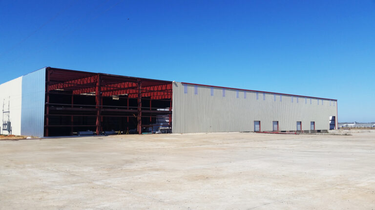 American Petroleum building exterior during construction with partially enclosed bay, Houston, TX - Keeton Construction Services