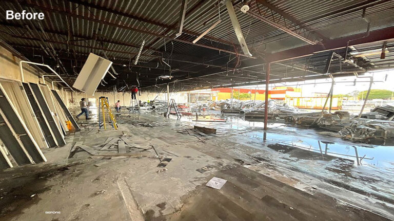 Fairmont Retail Center before work began, showing damaged interior with debris and destroyed roof, Pasadena TX - Keeton Construction Services
