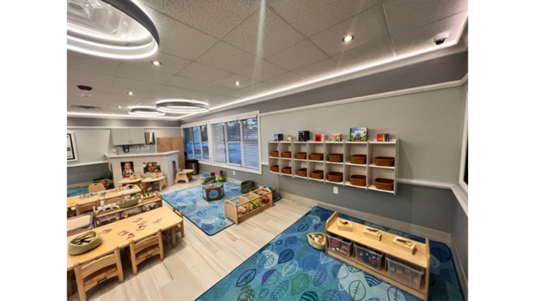 Classroom interior with wall shelving and child-sized tables at Prescolaire Early Learning Academy Katy, Keeton Construction Services, Katy TX