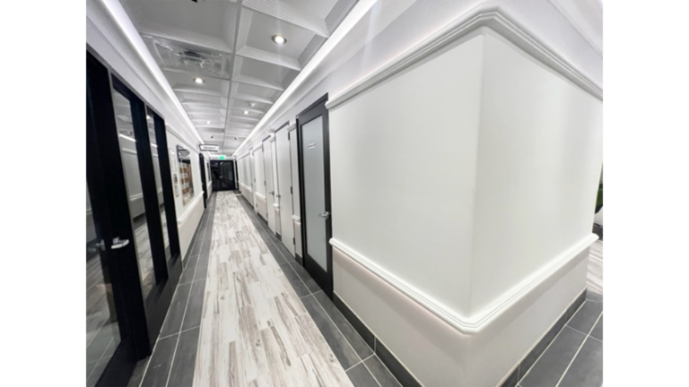 Interior hallway with doors on both sides at Prescolaire Early Learning Academy Katy, built by Keeton Construction Services, Katy TX