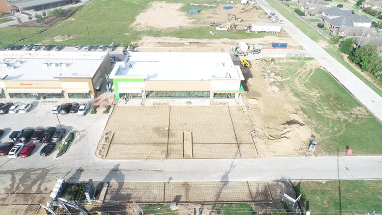 Aerial view of the Gourmet Foods building exterior during construction in Houston, TX showing the front facade, by Keeton Construction Services