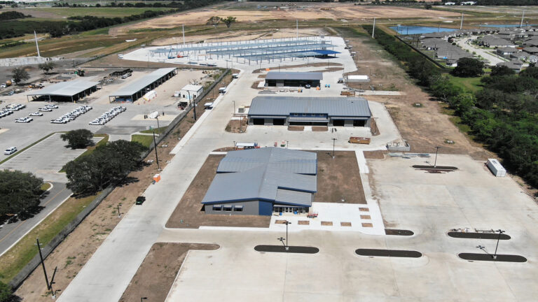 Lamar CISD Transportation Center Bus Canopies in Rosenberg TX - wide aerial view of the transportation center site during construction, Keeton Construction Services