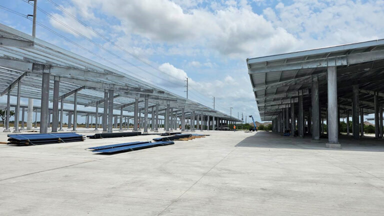 Lamar CISD Transportation Center Bus Canopies in Rosenberg TX - two canopy structures during construction, Keeton Construction Services
