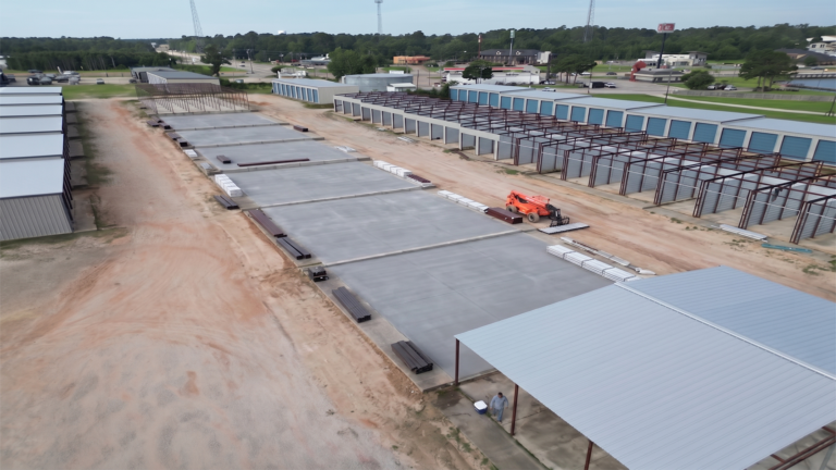 Lakeview Marina Boat Storage site work in progress in Conroe, TX with concrete slabs and framing underway by Keeton Construction Services
