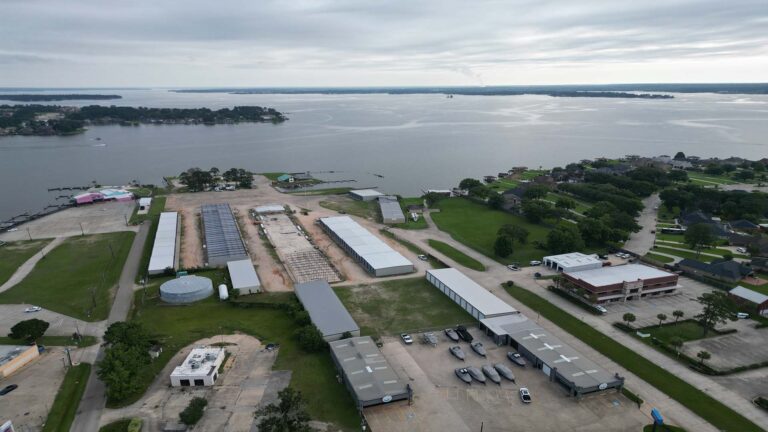 Aerial view of Lakeview Marina Boat Storage buildings near the water in Conroe, TX by Keeton Construction Services