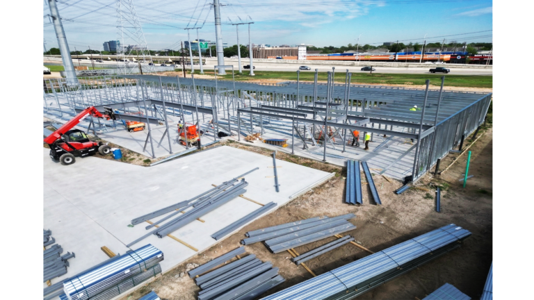 H-Town Public Storage in Houston, TX - aerial view of structural framing under construction with equipment on site, by Keeton Construction Services