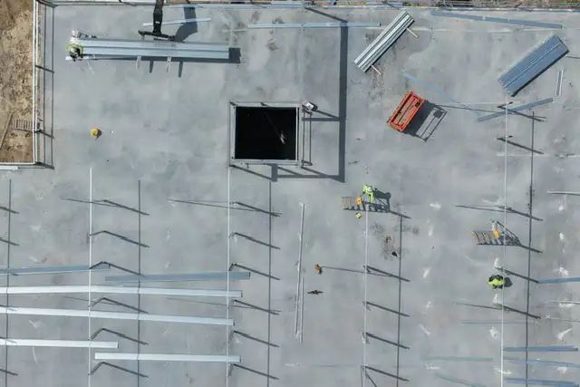H-Town Public Storage in Houston, TX - overhead view of workers and materials on the slab during construction by Keeton Construction Services