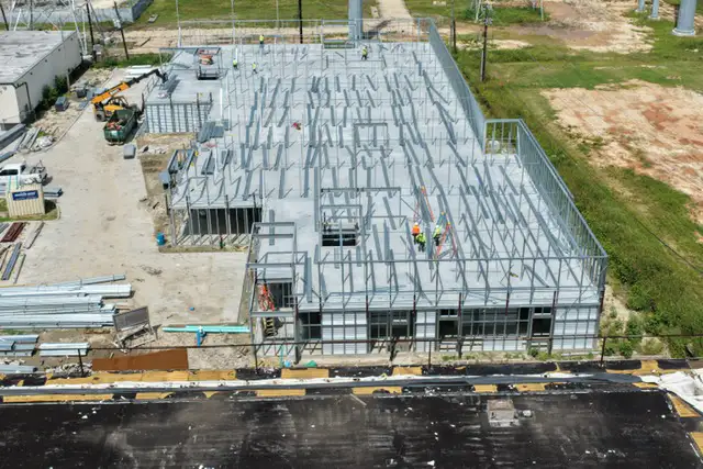 H-Town Public Storage in Houston, TX - aerial view showing framing progress and partial enclosure during construction by Keeton Construction Services